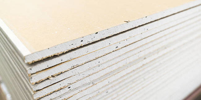 stack of gypsum board preparing for construction